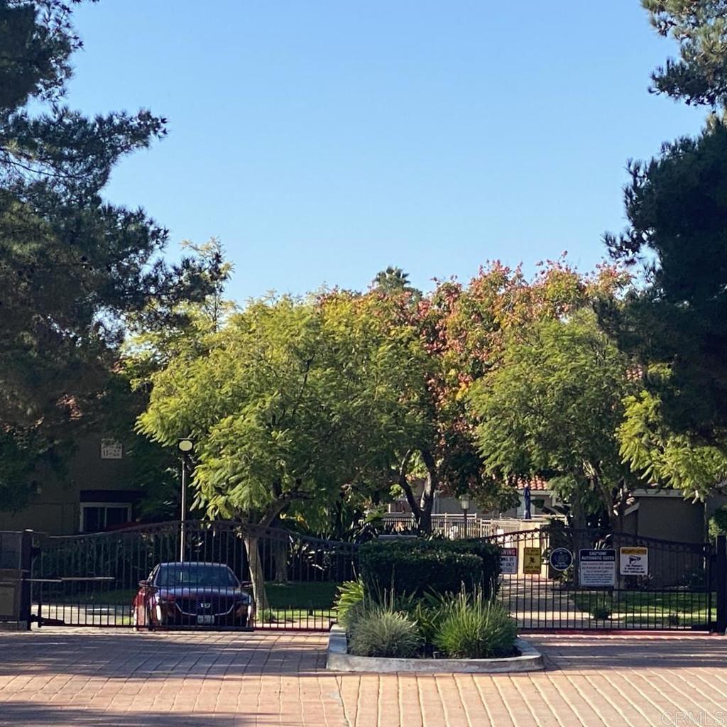 200 East Alessandro Boulevard, Unit 34 Riverside, CA 92508 - Photo 20 of 22 a view of a street with houses on both side