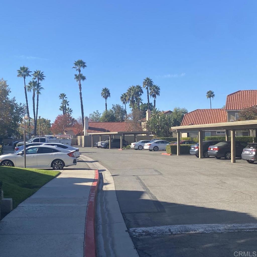 200 East Alessandro Boulevard, Unit 34 Riverside, CA 92508 - Photo 22 of 22 a front view of a house with garden
