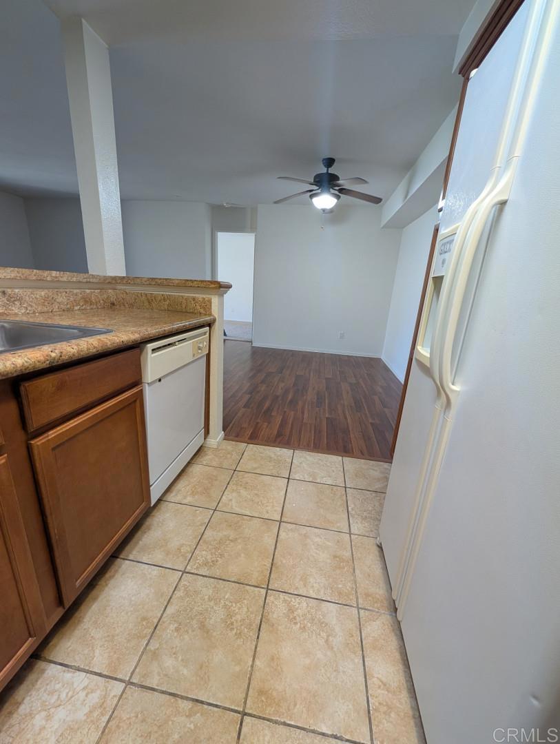 200 East Alessandro Boulevard, Unit 34 Riverside, CA 92508 - Photo 7 of 22 a kitchen with a cabinets and fireplace