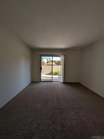 a view of a room that has a window in it