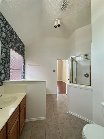a bathroom with a sink and mirror