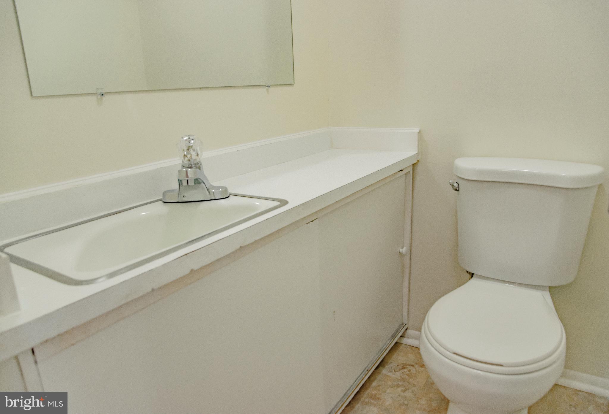 6961 Brookmill Road Baltimore, MD 21215 - Photo 8 of 26 Half Bath