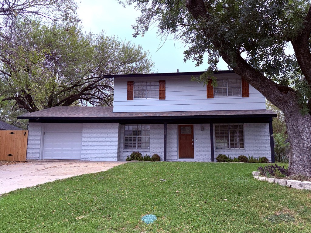 5413 Coventry Lane Austin, TX 78723 - Photo 1 of 25 a house view with a garden space