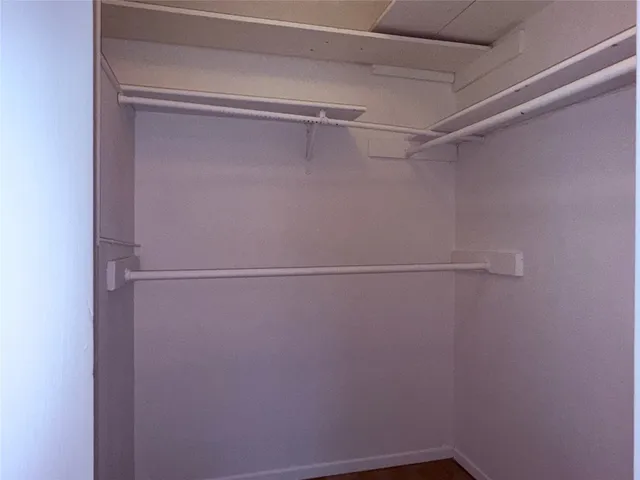 a view of a room with racks on the wall