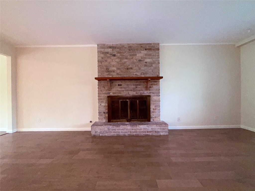 5413 Coventry Lane Austin, TX 78723 - Photo 5 of 25 a living room with a fireplace and a fireplace