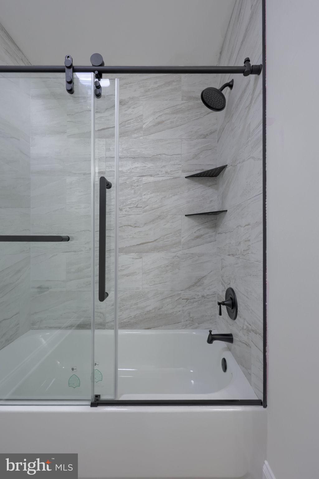 310 Kendale Road Red Lion, PA 17356 - Photo 23 of 42 a bathroom with a shower and a bath tub