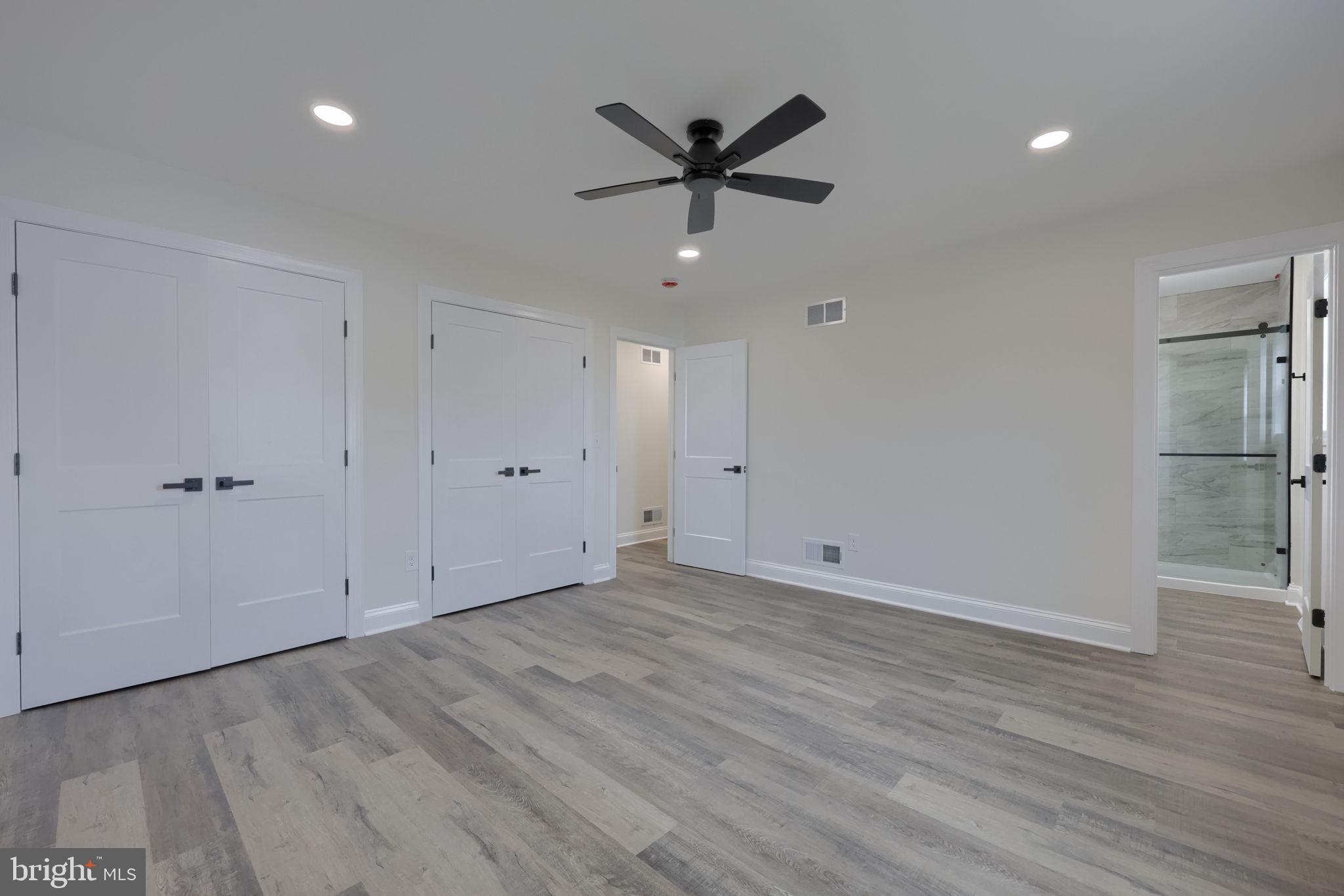 310 Kendale Road Red Lion, PA 17356 - Photo 25 of 42 wooden floor in an empty room with a ceiling fan