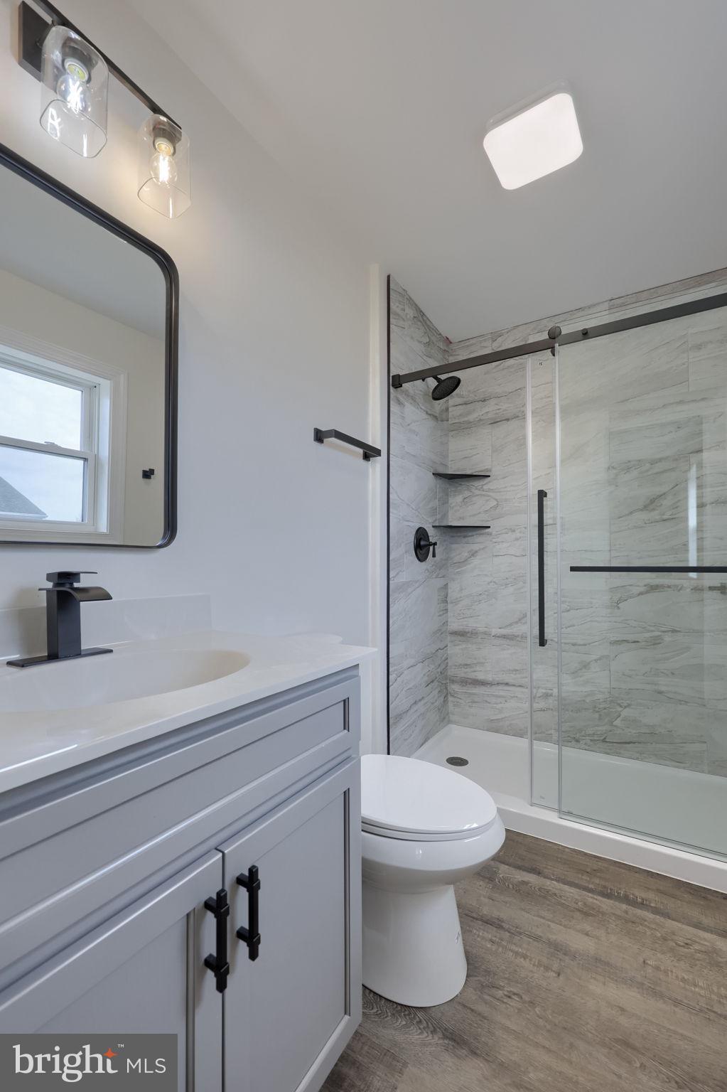 310 Kendale Road Red Lion, PA 17356 - Photo 26 of 42 a bathroom with a toilet a sink and shower