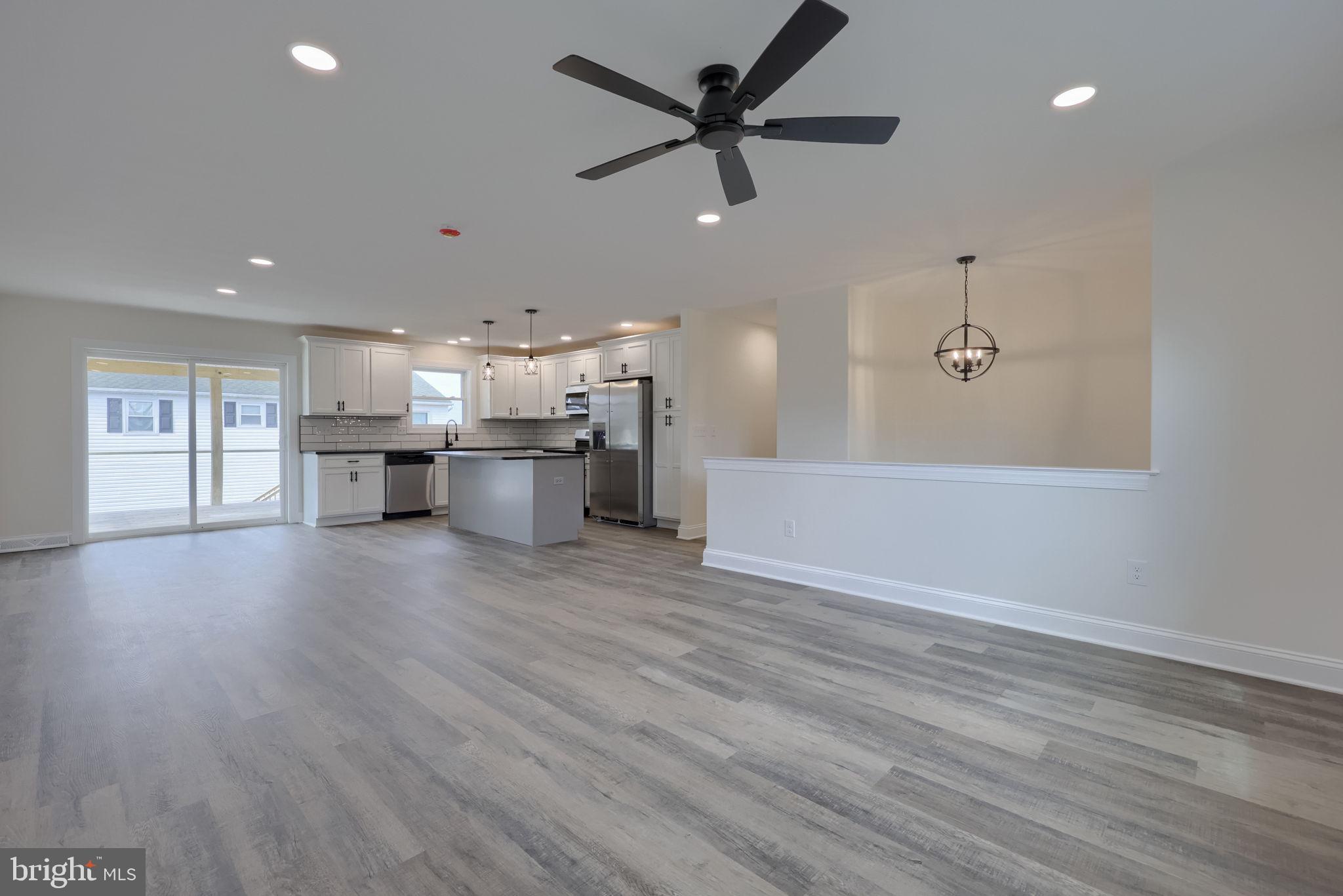 310 Kendale Road Red Lion, PA 17356 - Photo 7 of 42 a view of a kitchen with a sink and a stove top oven