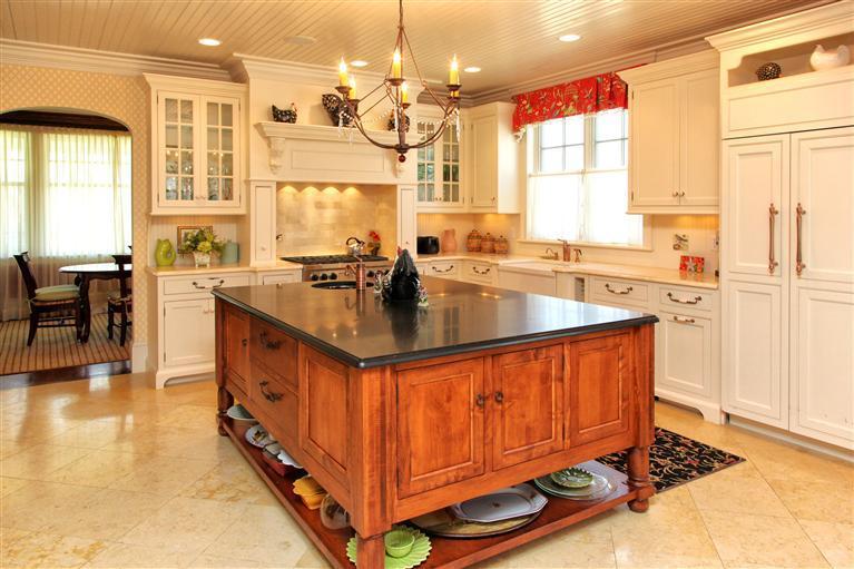 268 Parker Road Osterville, MA 02655 - Photo 11 of 28 a kitchen with stainless steel appliances granite countertop a sink stove and cabinets