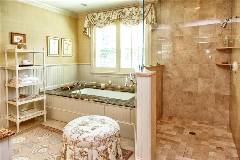 268 Parker Road Osterville, MA 02655 - Photo 17 of 28 a bathroom with a granite countertop sink a toilet and shower