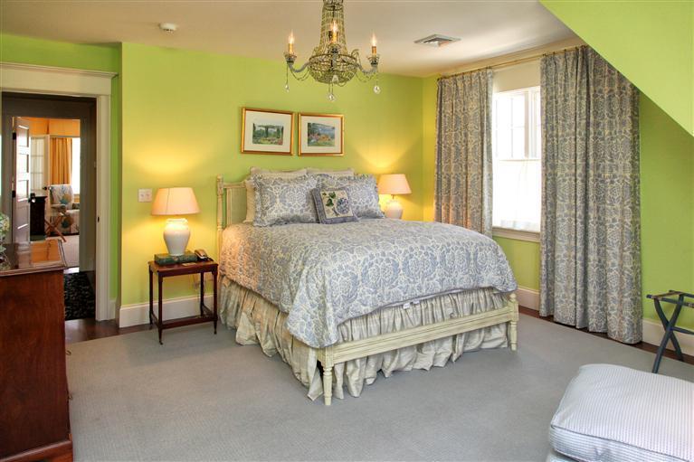268 Parker Road Osterville, MA 02655 - Photo 21 of 28 a bedroom with a bed chandelier and a window