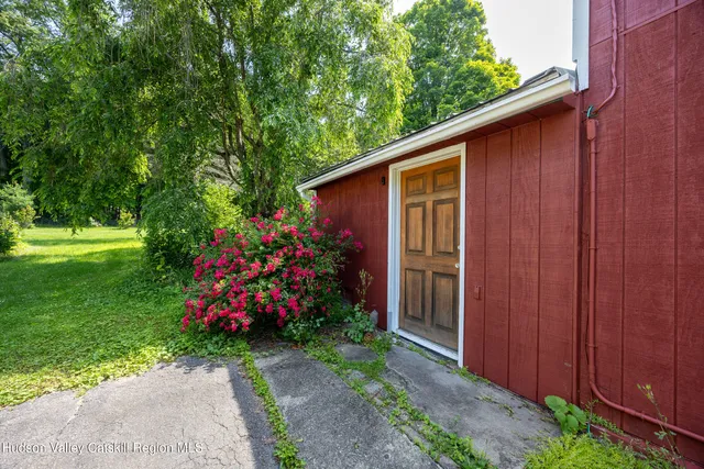 a backyard of a house with lots of green space