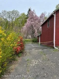 a aerial view of a house with a yard