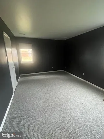 a bathroom with a bath tub