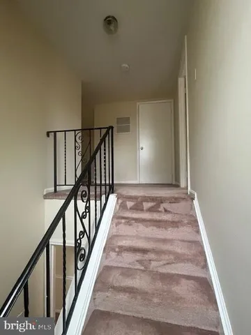 a view of a barn in the back yard