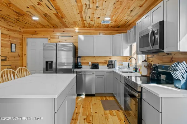 a bathroom with a toilet and a sink