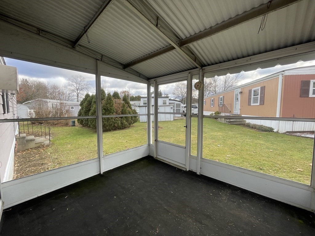 239 Ayer Road, Unit 49 Littleton, MA 01460 - Photo 12 of 21 a view of an outdoor space with swimming pool