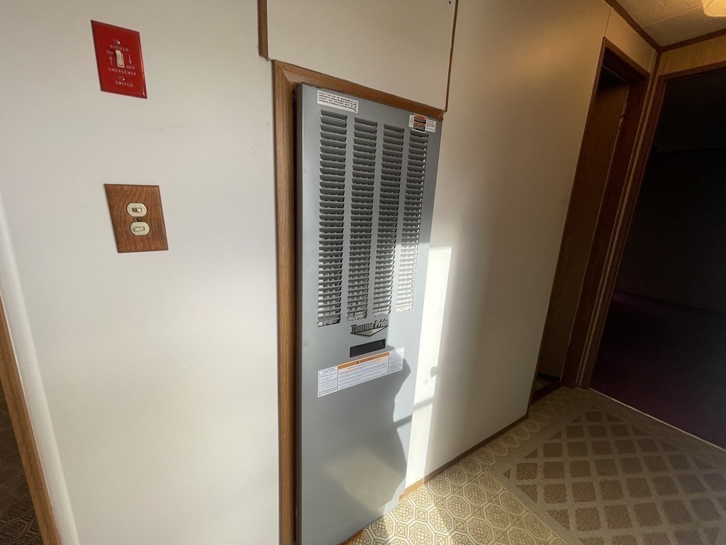 239 Ayer Road, Unit 49 Littleton, MA 01460 - Photo 17 of 21 a view of hallway with stairs and furniture