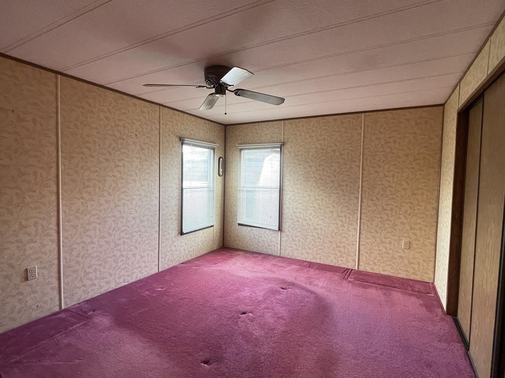 239 Ayer Road, Unit 49 Littleton, MA 01460 - Photo 19 of 21 a view of empty room with windows