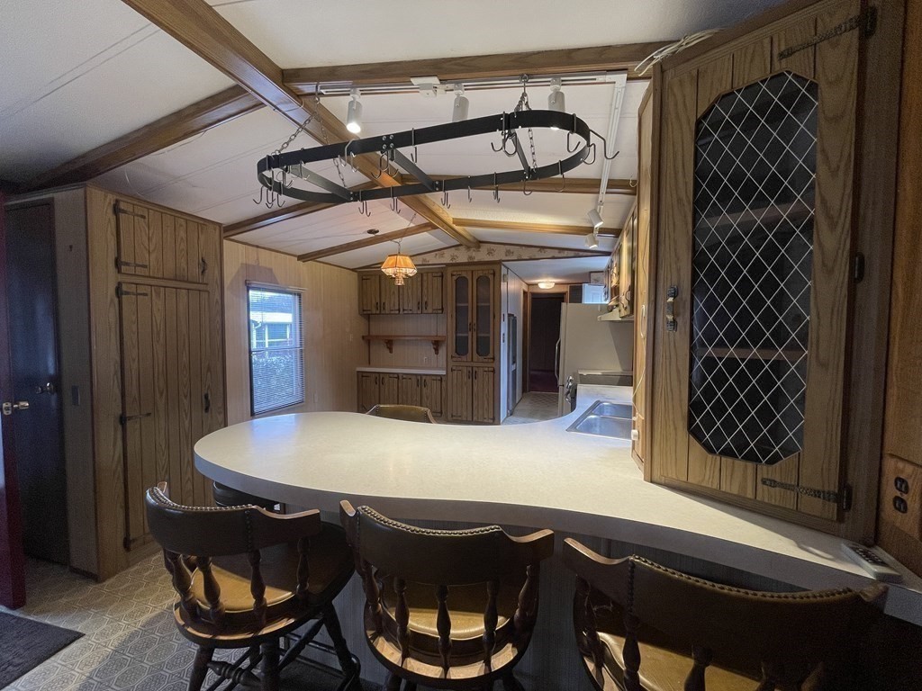 239 Ayer Road, Unit 49 Littleton, MA 01460 - Photo 5 of 21 a view of a dining room with furniture