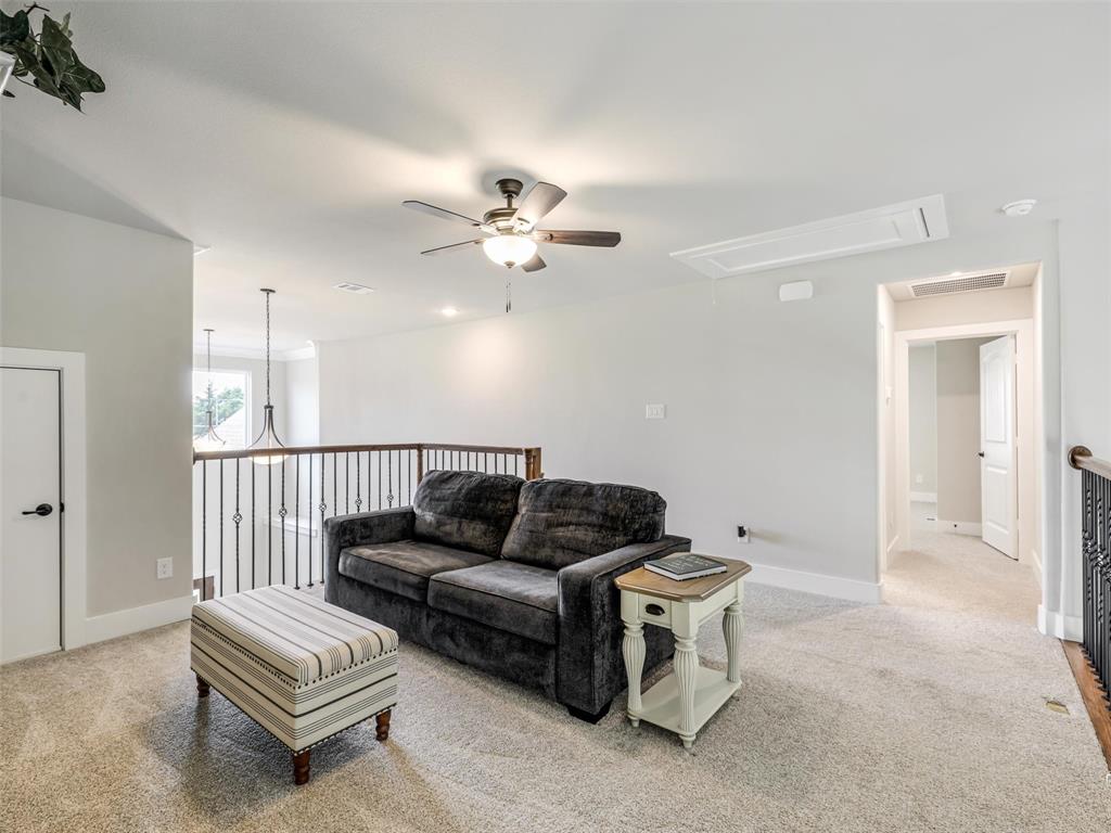 544 Majors Road Van Alstyne, TX 75495 - Photo 23 of 36 a living room with furniture and a ceiling fan