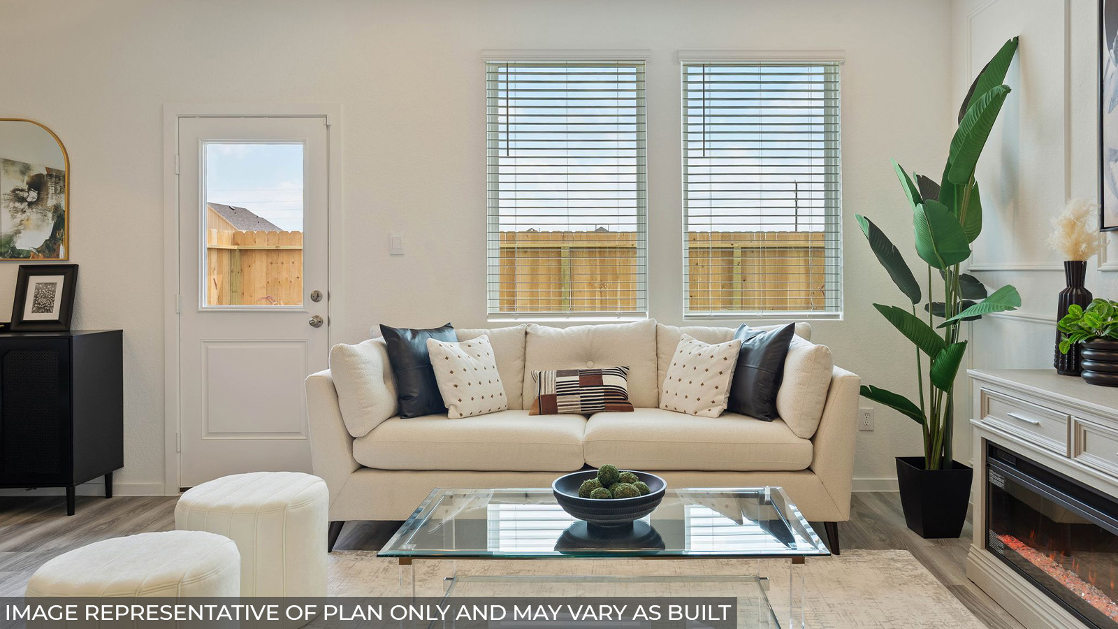 232 Flying Tigers Trail Jarrell, TX 76537 - Photo 11 of 22 a living room with furniture a flat screen tv and a large window