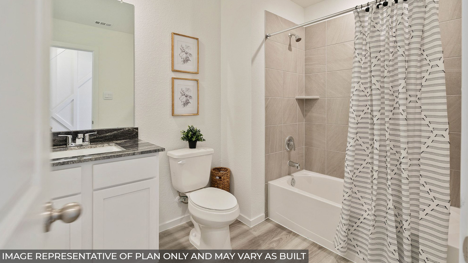 232 Flying Tigers Trail Jarrell, TX 76537 - Photo 16 of 22 a bathroom with a toilet sink vanity tub and shower