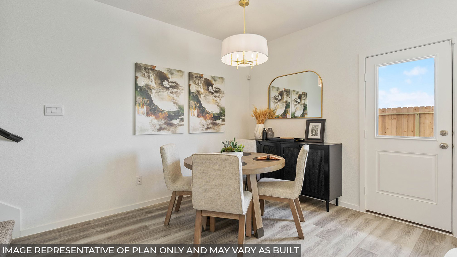 232 Flying Tigers Trail Jarrell, TX 76537 - Photo 6 of 22 a view of a dining room with furniture and wooden floor