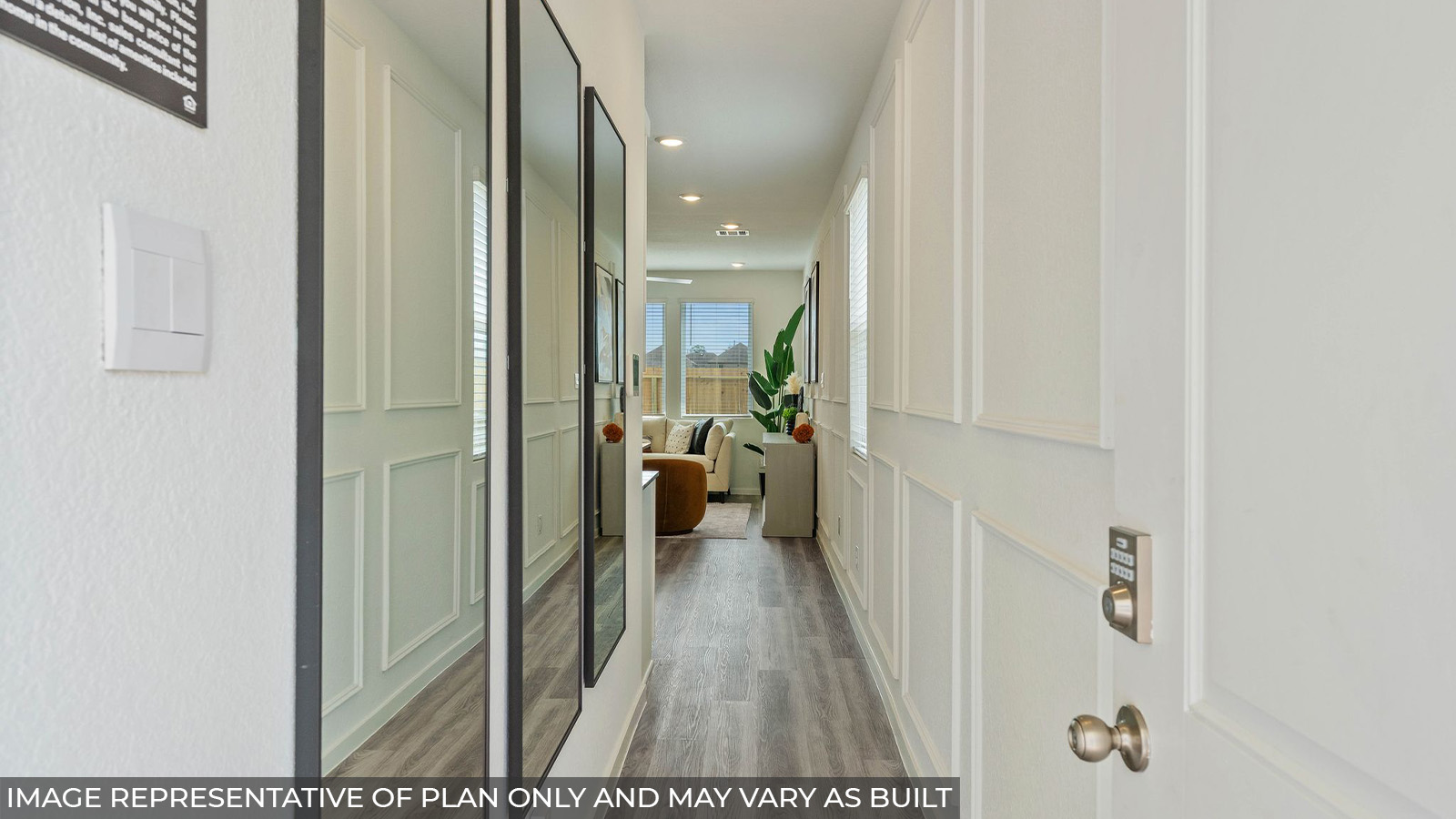 232 Flying Tigers Trail Jarrell, TX 76537 - Photo 8 of 22 a view of a hallway with large mirror and furniture