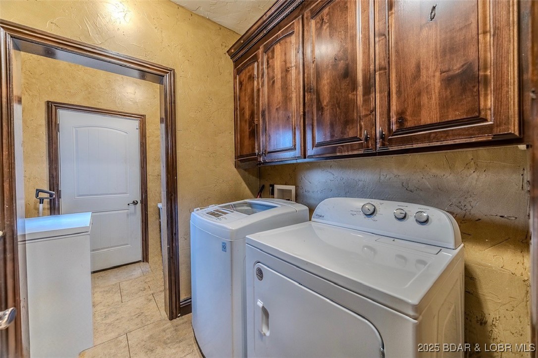 50 Go Ye Ranch Road Brumley, MO 65017 - Photo 31 of 45 Laundry room with storage and comes complete with