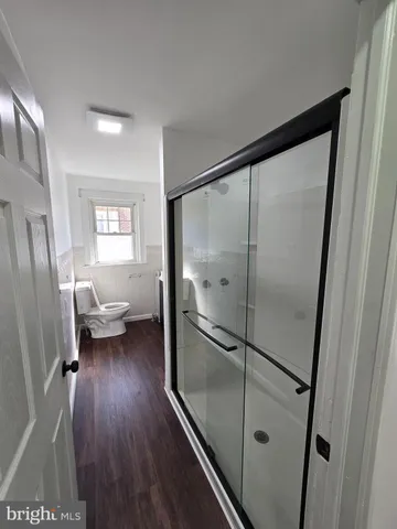 a kitchen with a sink and refrigerator