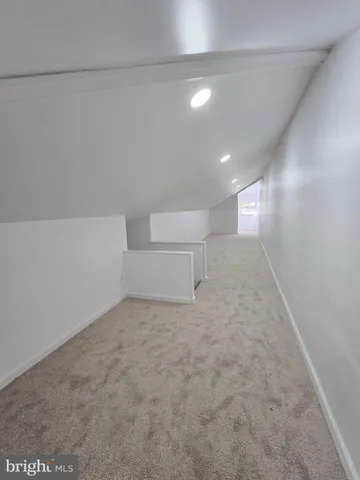 a view of a hardwood & staircase