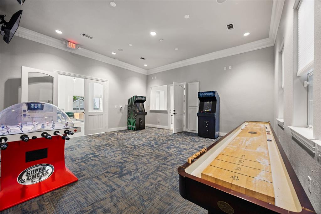 9009 North FM 620, Unit 702 Austin, TX 78726 - Photo 12 of 19 a living room with kitchen island fireplace and furniture