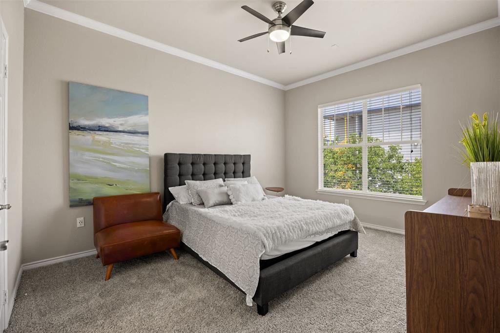 9009 North FM 620, Unit 702 Austin, TX 78726 - Photo 3 of 19 a bedroom with a bed and a couch