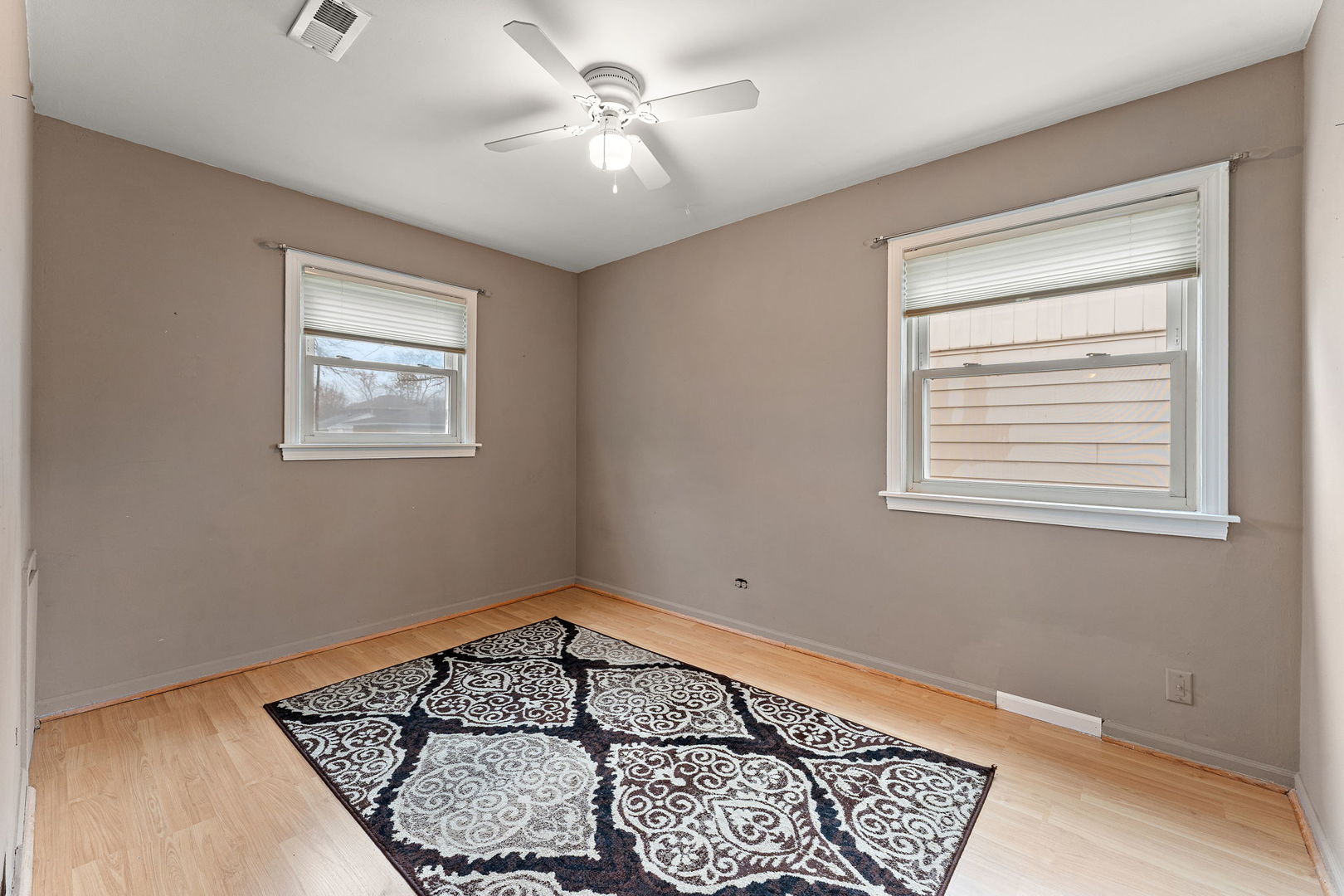 3520 Jackson Street Lansing, IL 60438 - Photo 11 of 22 a bedroom with bed and window