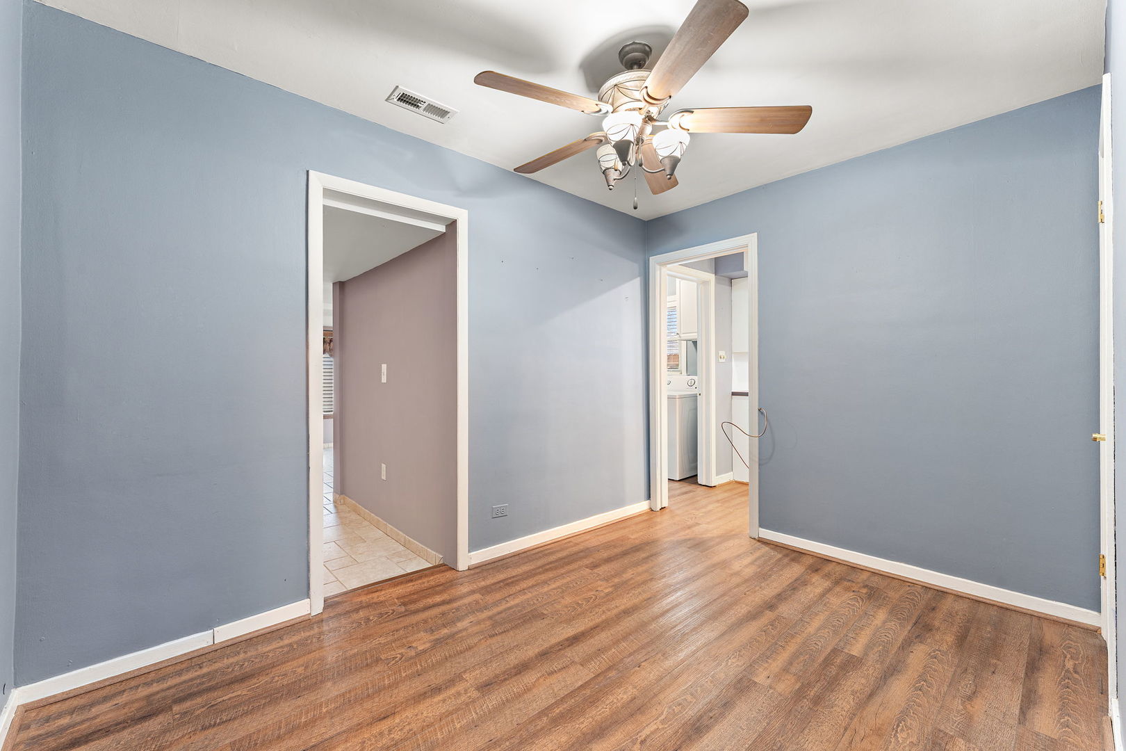 3520 Jackson Street Lansing, IL 60438 - Photo 13 of 22 a view of an empty room with wooden floor