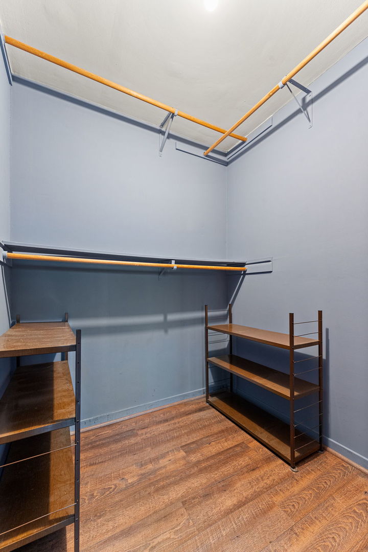 3520 Jackson Street Lansing, IL 60438 - Photo 17 of 22 a storage room with wooden floor and furniture