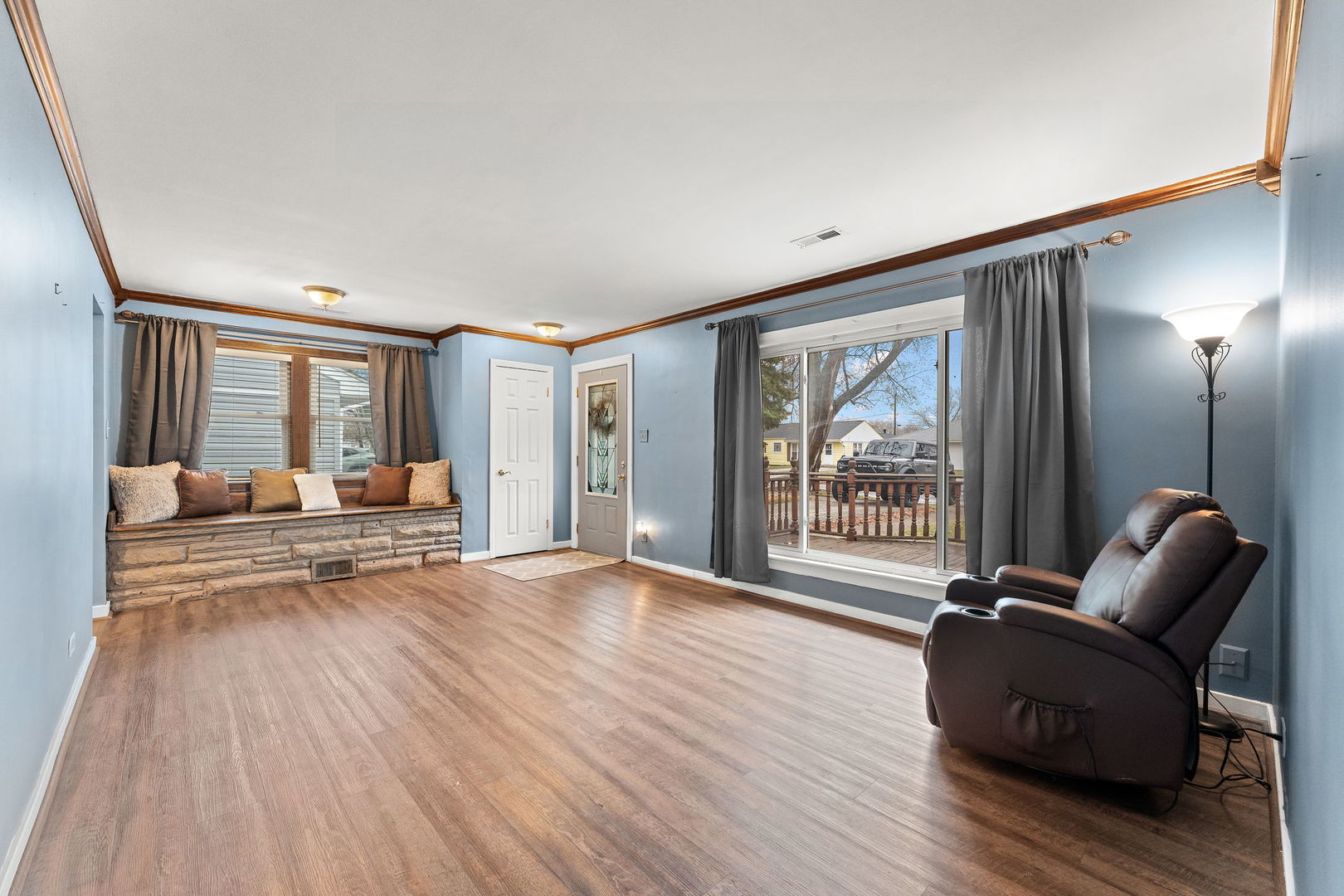 3520 Jackson Street Lansing, IL 60438 - Photo 3 of 22 a living room with furniture and a large window