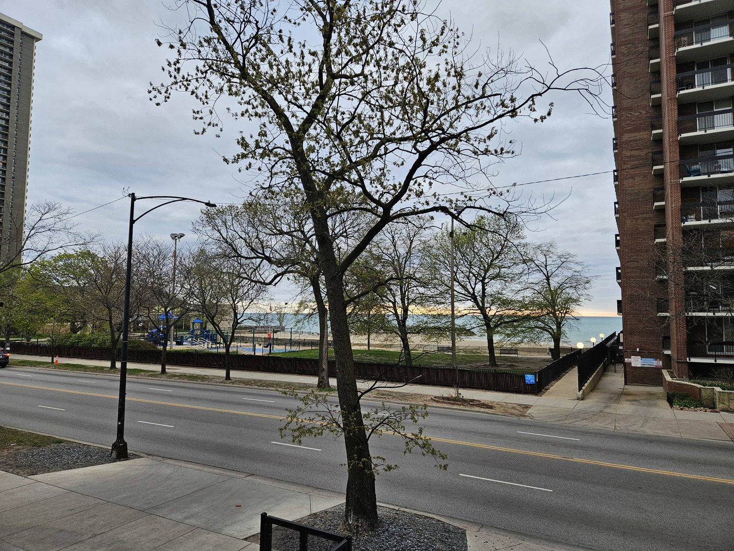 5906 North Sheridan Road, Unit 4A Chicago, IL 60660 - Photo 4 of 15 a view of a building with a street
