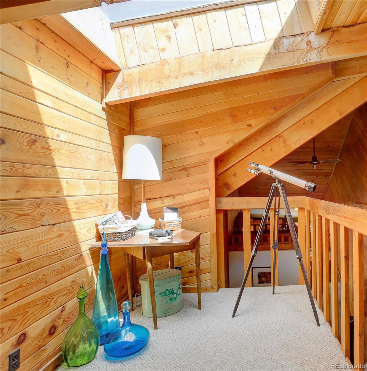 77 East Crosscut Road Bailey, CO 80421 - Photo 32 of 43 a view of entryway with wooden floor