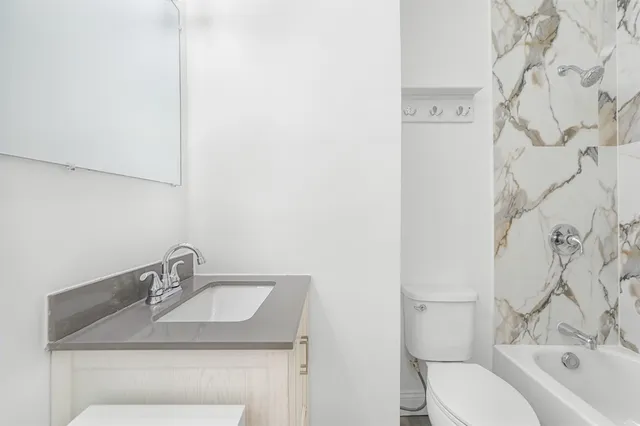 a bathroom with a sink and a toilet