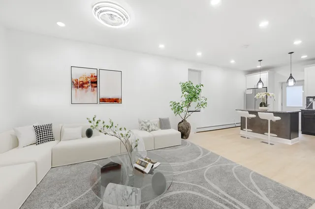 a living room with furniture and a couch