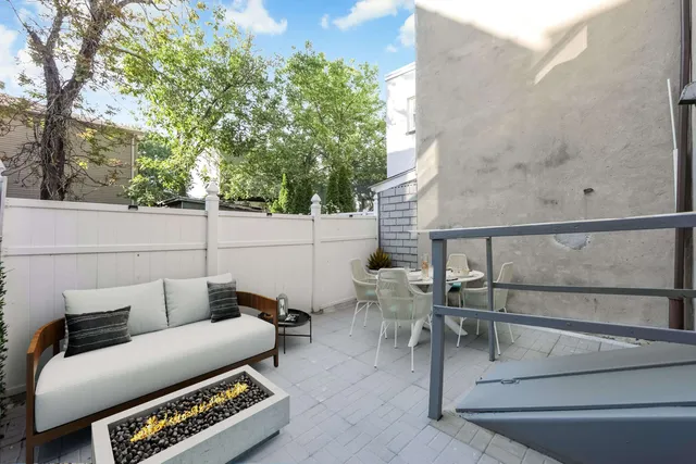 a building outdoor space with patio furniture