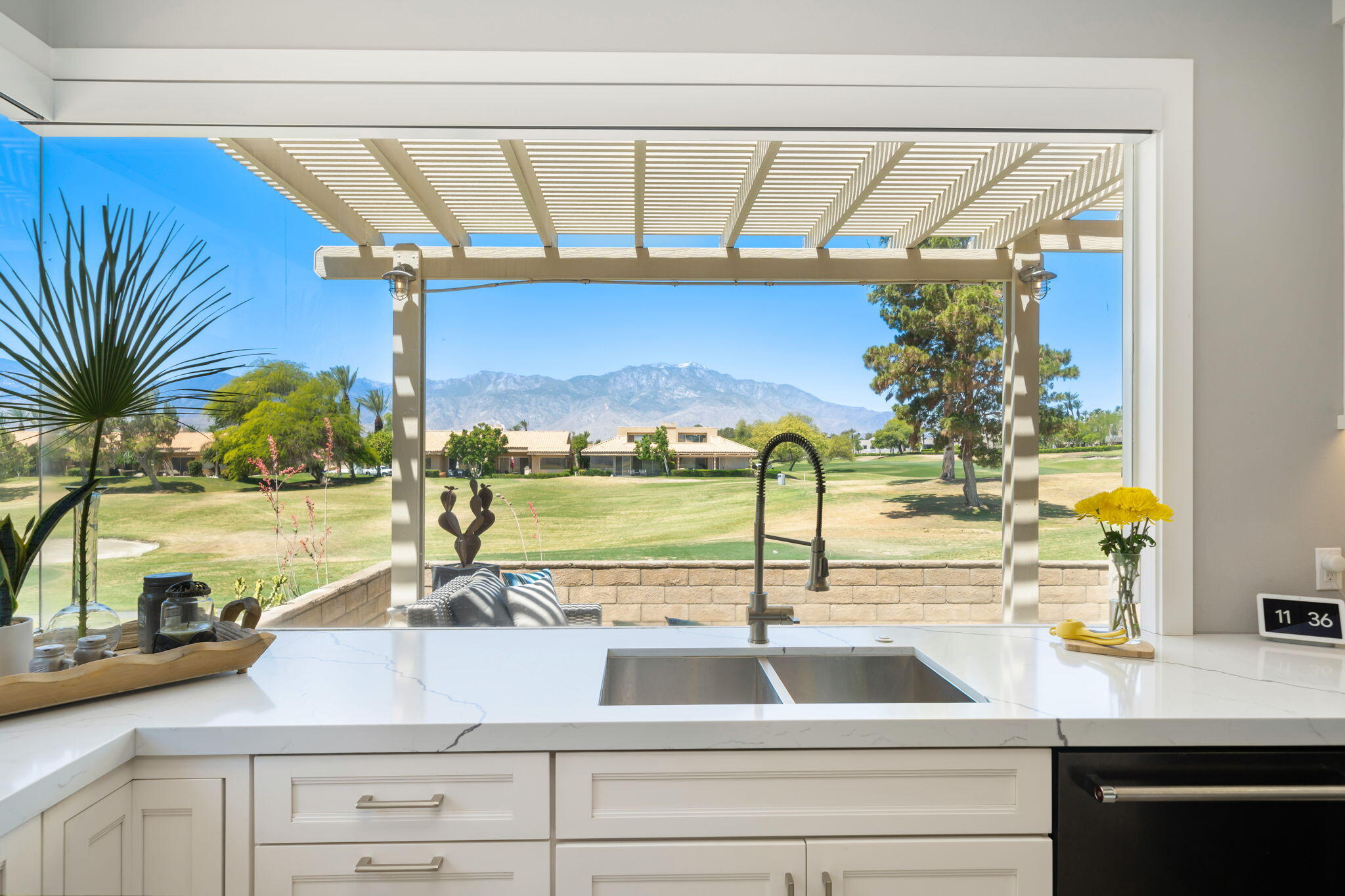 a kitchen with a sink and a window