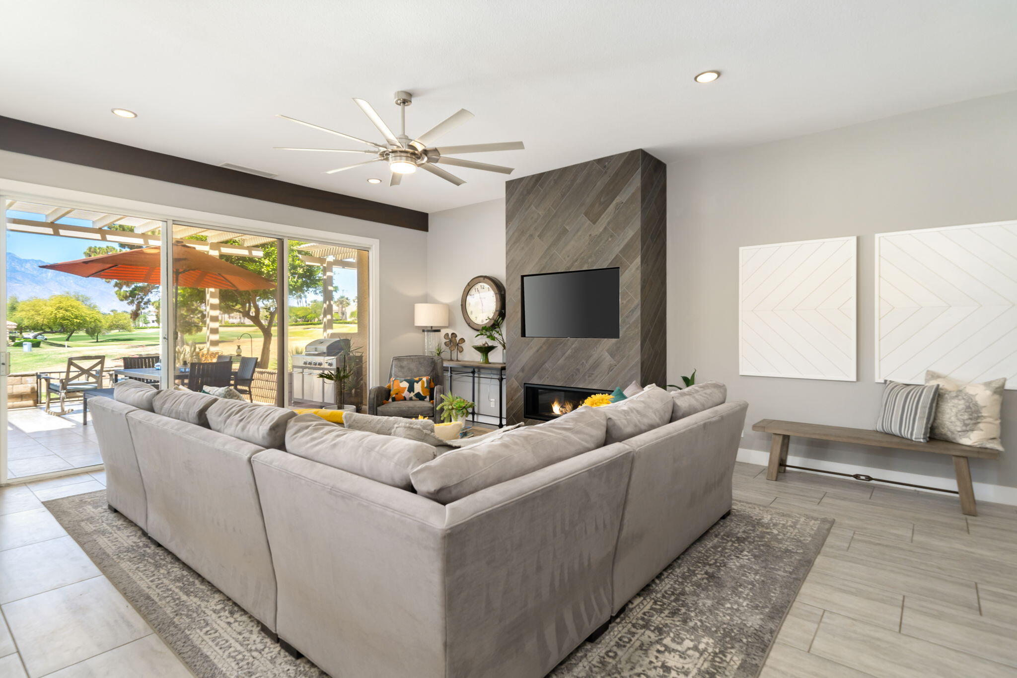 93 Augusta Drive Rancho Mirage, CA 92270 - Photo 11 of 39 a living room with furniture and a large window