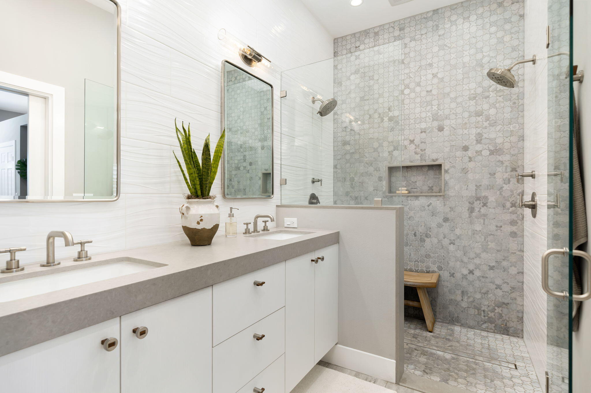 93 Augusta Drive Rancho Mirage, CA 92270 - Photo 28 of 39 a bathroom with a double vanity sink and a mirror
