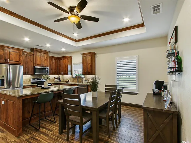 a view of a dining room with furniture