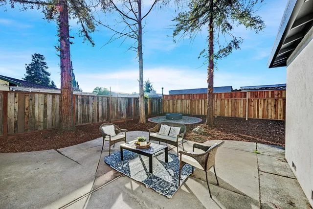 a garden view with a seating space