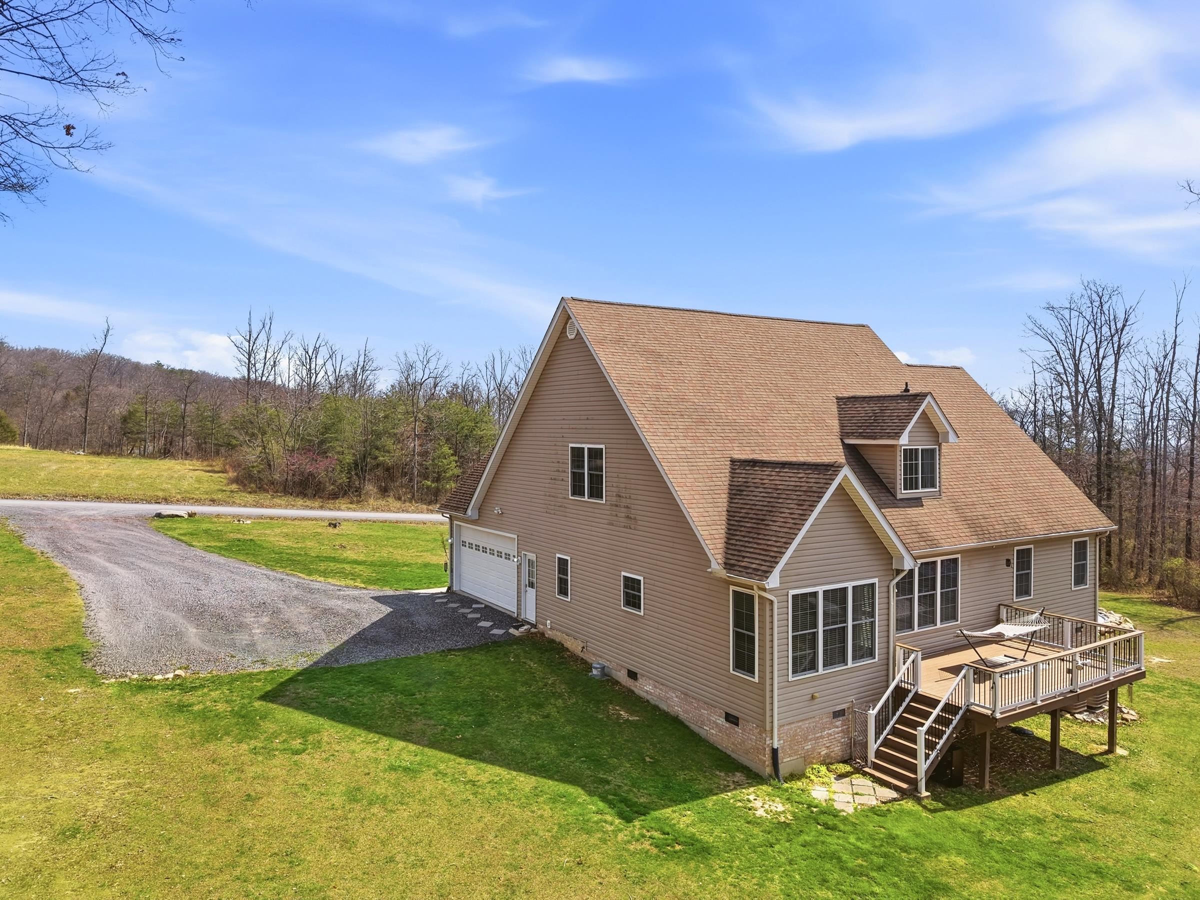 257 Hunter Road Maurertown, VA 22644 - Photo 2 of 61 an aerial view of a house with a yard